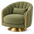 Sillón tapizado de líneas curvas con acolchado acanalado, verde y dorado